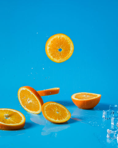 A close-up of an orange, highlighting the vitamin C content, which is an important ingredient in many anti-aging skincare products.