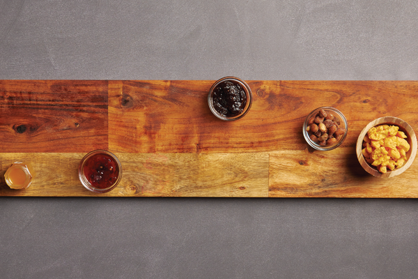 Image of jars placed on empty wooden board