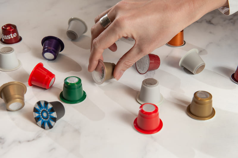 Nespresso-pods-hand-choosing-capsule