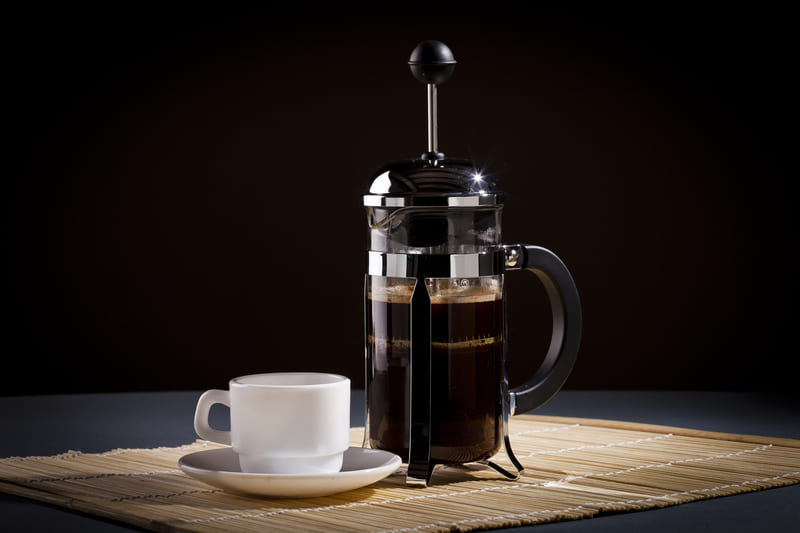 filter-coffee-french-press-with-cup-next-to-it