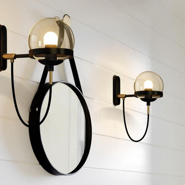 Lights of Scandinavia - Höskulle - Postmodern lighting. Wall-mounted E27 fixture. Works just as good in the bedroom as in corridors, hallways and the conservatory.  Iron fixture with two different glass variations to choose from.   Specifications    Shipping      Why Us?