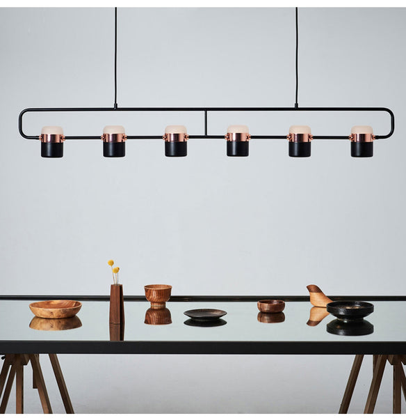 Lights of Scandinavia - La Scène - Creative multi-head LED Chandelier ala Nordic style. Good fit for the coffee shop, kitchen island or the dining room.   Length of suspension wire is adjustable.  Black or White.