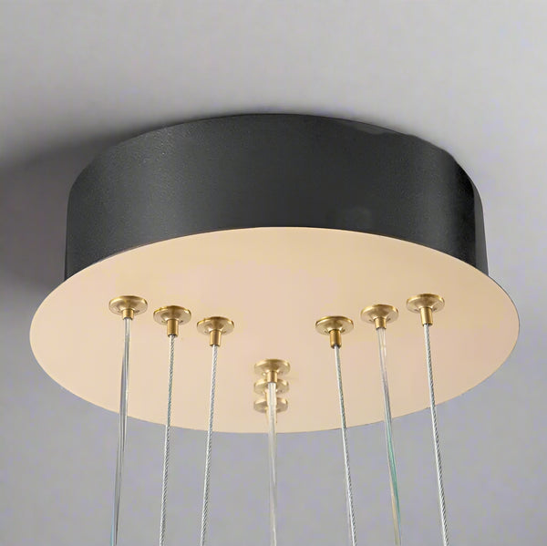 Dröme modern LED chandelier with sculptural acrylic rings and soft ambient glow, Nordic-style ceiling light ideal for living rooms, bedrooms, stairwells, and hotel lobbies.