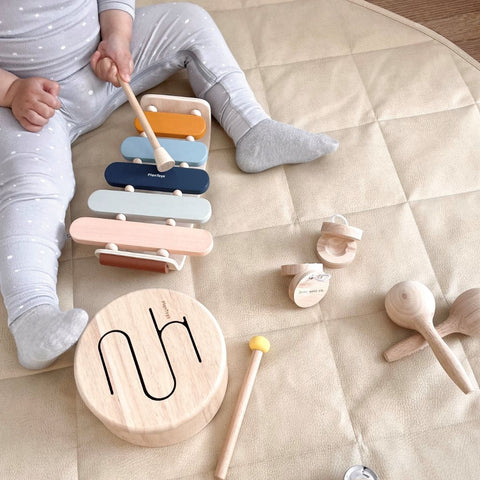 photo of a toddler playing with Carami toys