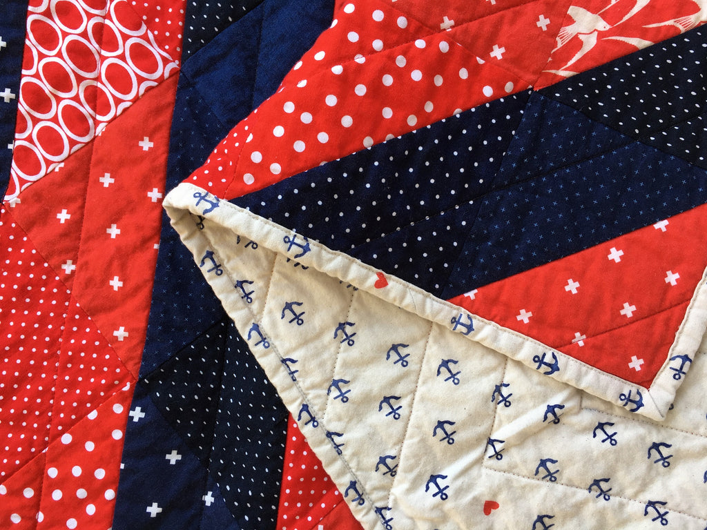 Ripple and Swirl Quilt Pattern by Penny Spool Quilts, red and navy baby quilt