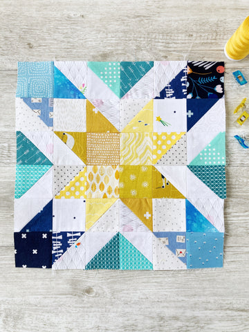 Star Gems quilt block pattern by Penny Spool Quilts - sample block in yellow blue and turquoise