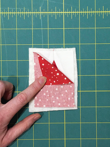 Festive Forest by Penny Spool Quilts - Christmas Tree Ornament Tutorial - quilted block with backing fabric on top, ready to sew together