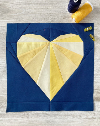 Rays of Love FPP quilt block pattern - Penny Spool Quilts - yellow heart on navy background