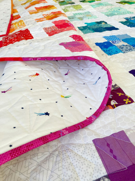Scrappy Love quilt pattern by Penny Spool Quilts - rainbow sample quilt