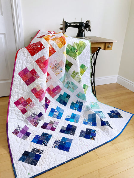 Scrappy Love quilt pattern by Penny Spool Quilts - rainbow sample quilt