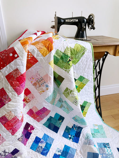 Scrappy Love quilt pattern by Penny Spool Quilts - rainbow sample quilt