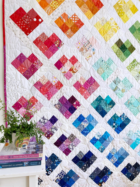 Scrappy Love quilt pattern by Penny Spool Quilts - rainbow sample quilt