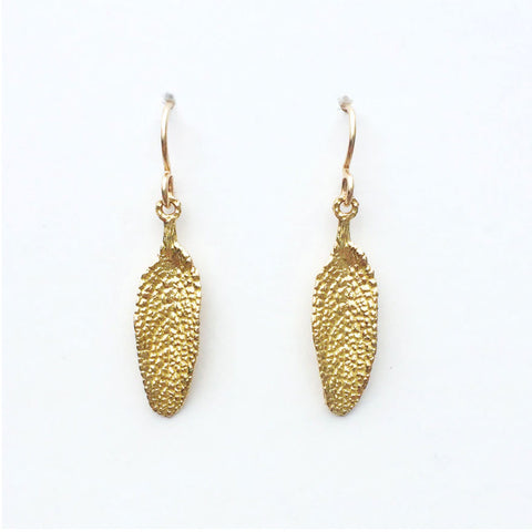 sage leaf earrings in golden bronze on white background