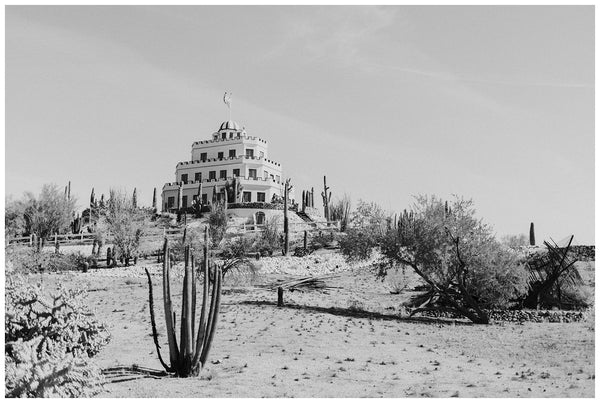 Tovrea Castle black and white image of the wedding cake castle on a hill surrounded by a cactus garden Phoenix Arizona