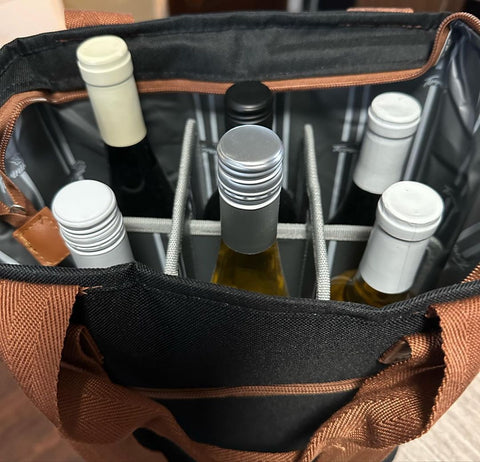 The insulated bag has 6 compartments with 6 bottles of wine in the compartments