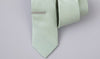 Silver Tie Bar on a green and white dotted tie
