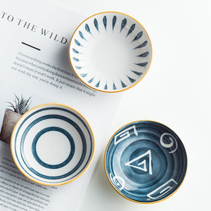 Showing a few of our Marya Mini Ceramic Bowls on an open book