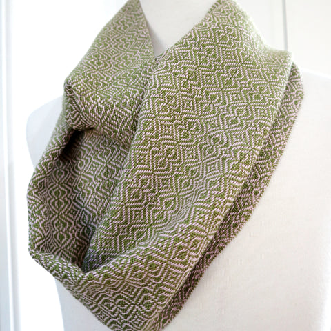 Handwoven cotton scarf in olive green with dusty pink