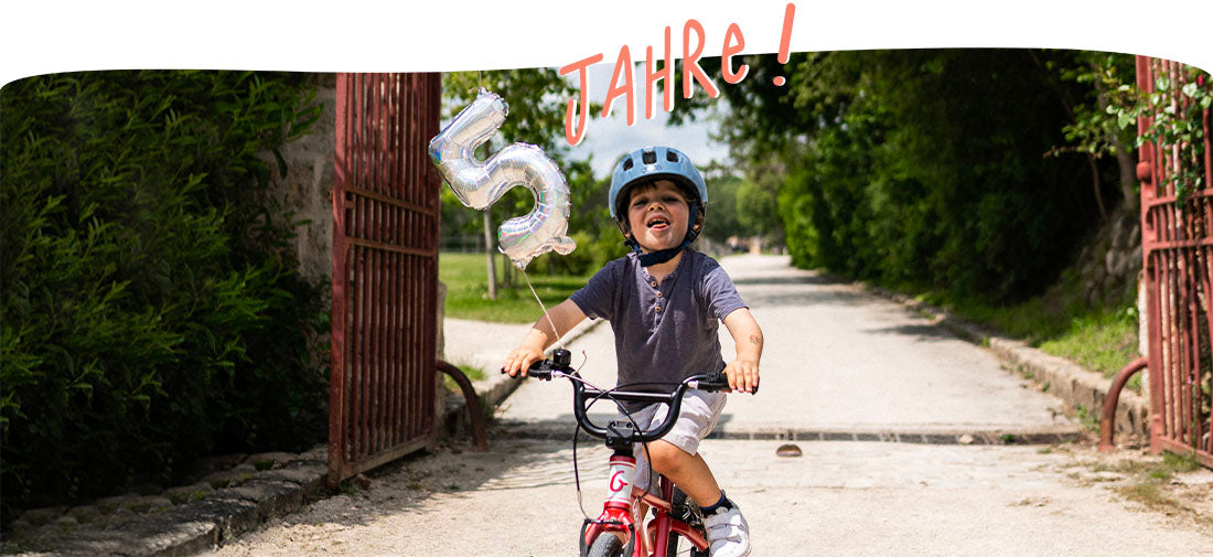 Enfant avec vélo à 5 ans 