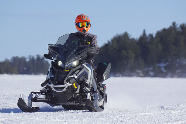 For those of us lucky enough to have toys, Snowmobiling is a ton of fun in the backwoods, even if the backwoods is street in front of your house.