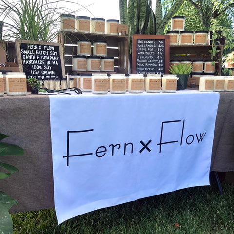 Fern x Flow farmers market soy candle table display