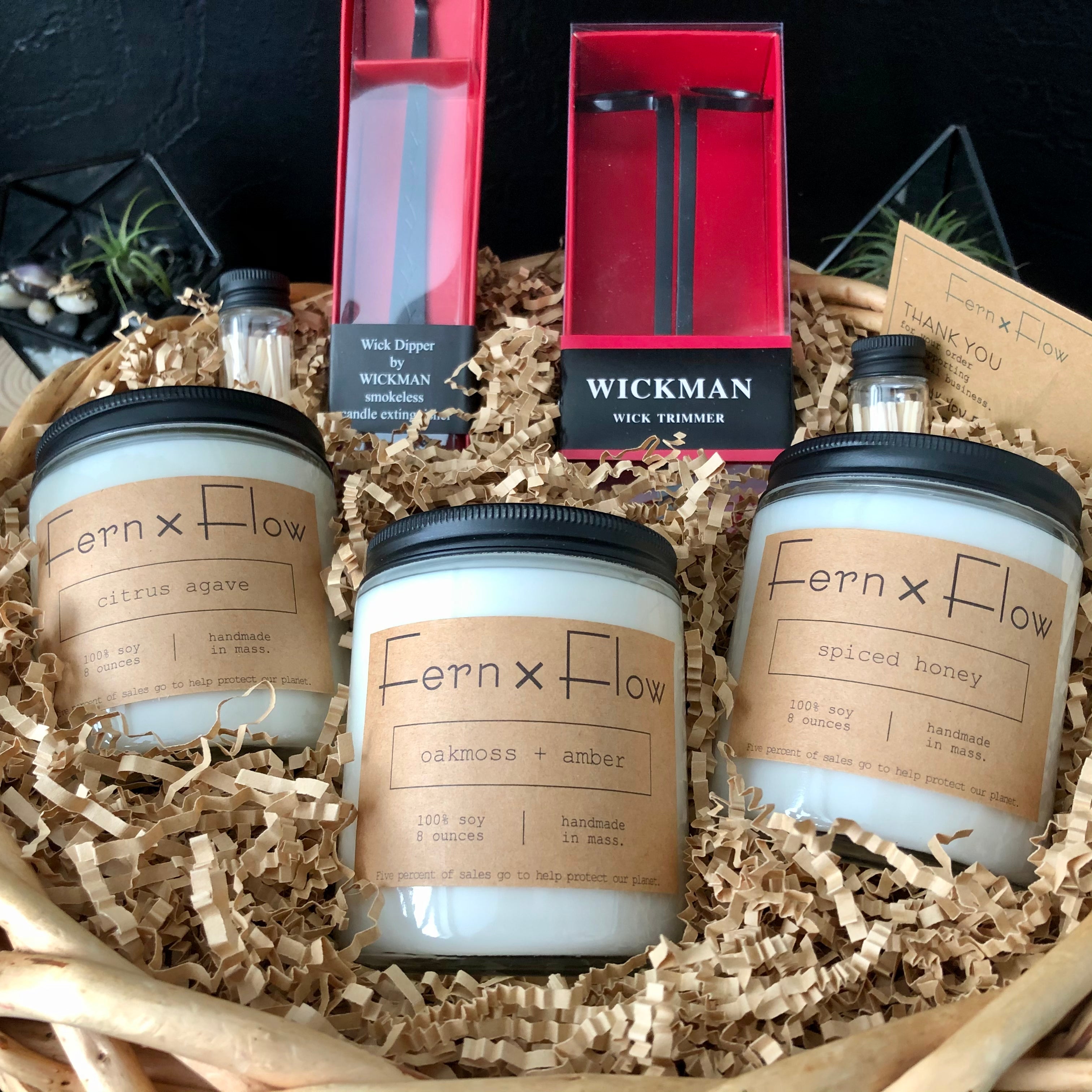 Fern x Flow soy candle gift basket featuring their Signature collection of soy candles and candle accessories in a gift basket.