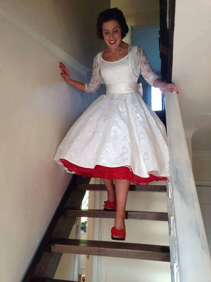 Add a dash of colour to your retro style wedding dress with a petticoat and accessories.