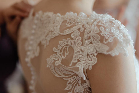 lace boho wedding dress back showing button detail