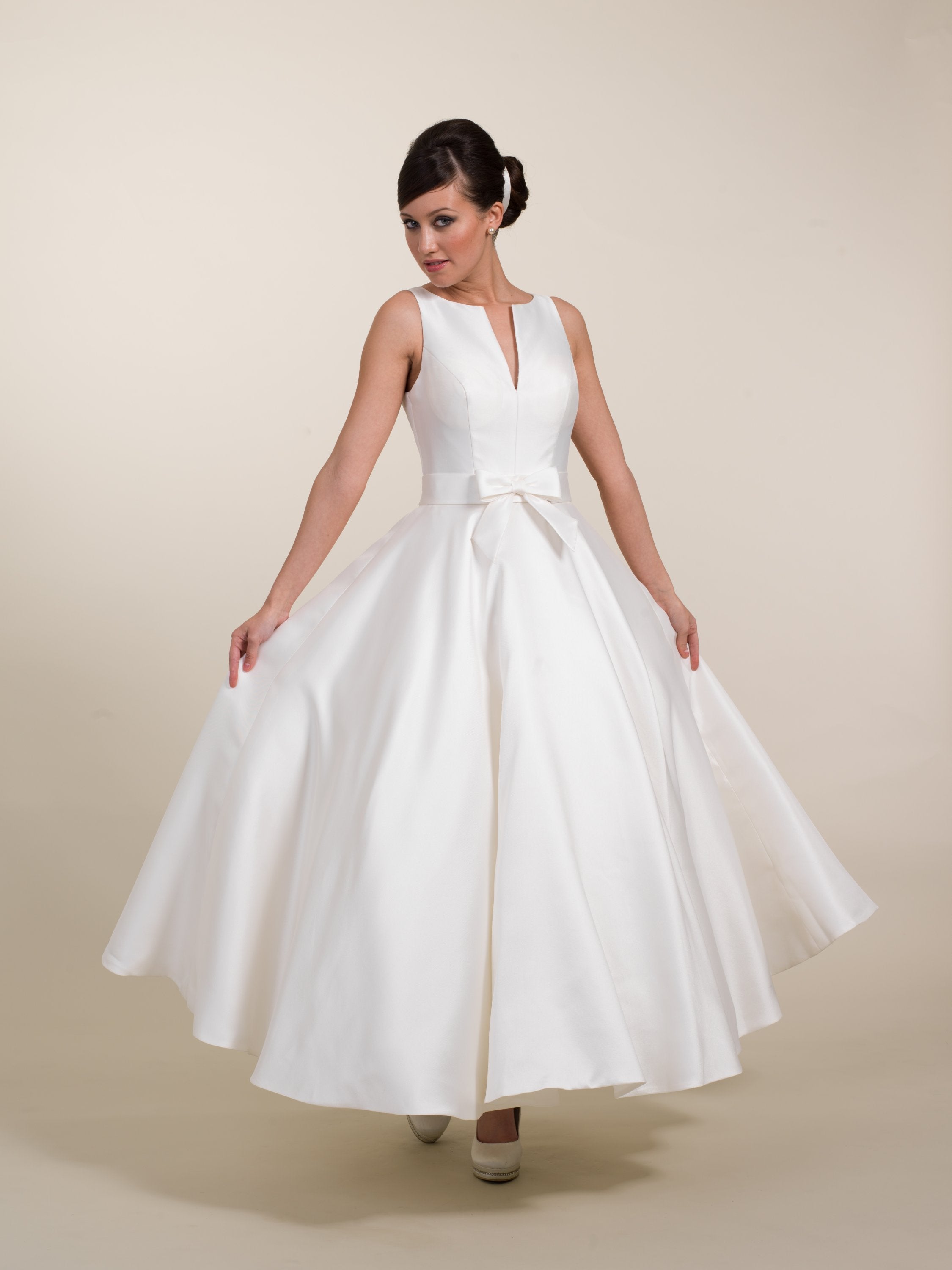 Image of Veronica - a tea length Mikado wedding gown with waist bow and full circle skirt