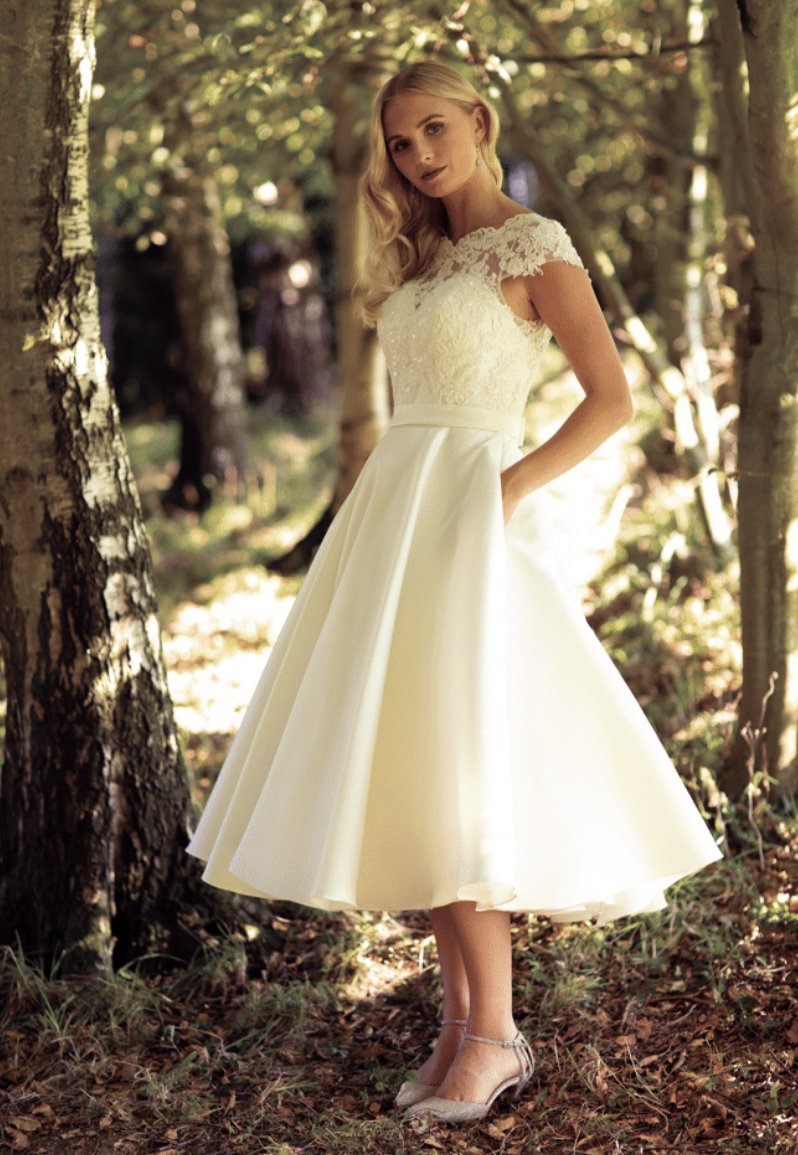 Plunging V-Neck Bridal Gown with Tulle Handkerchief Skirt by Lillian West -  66226