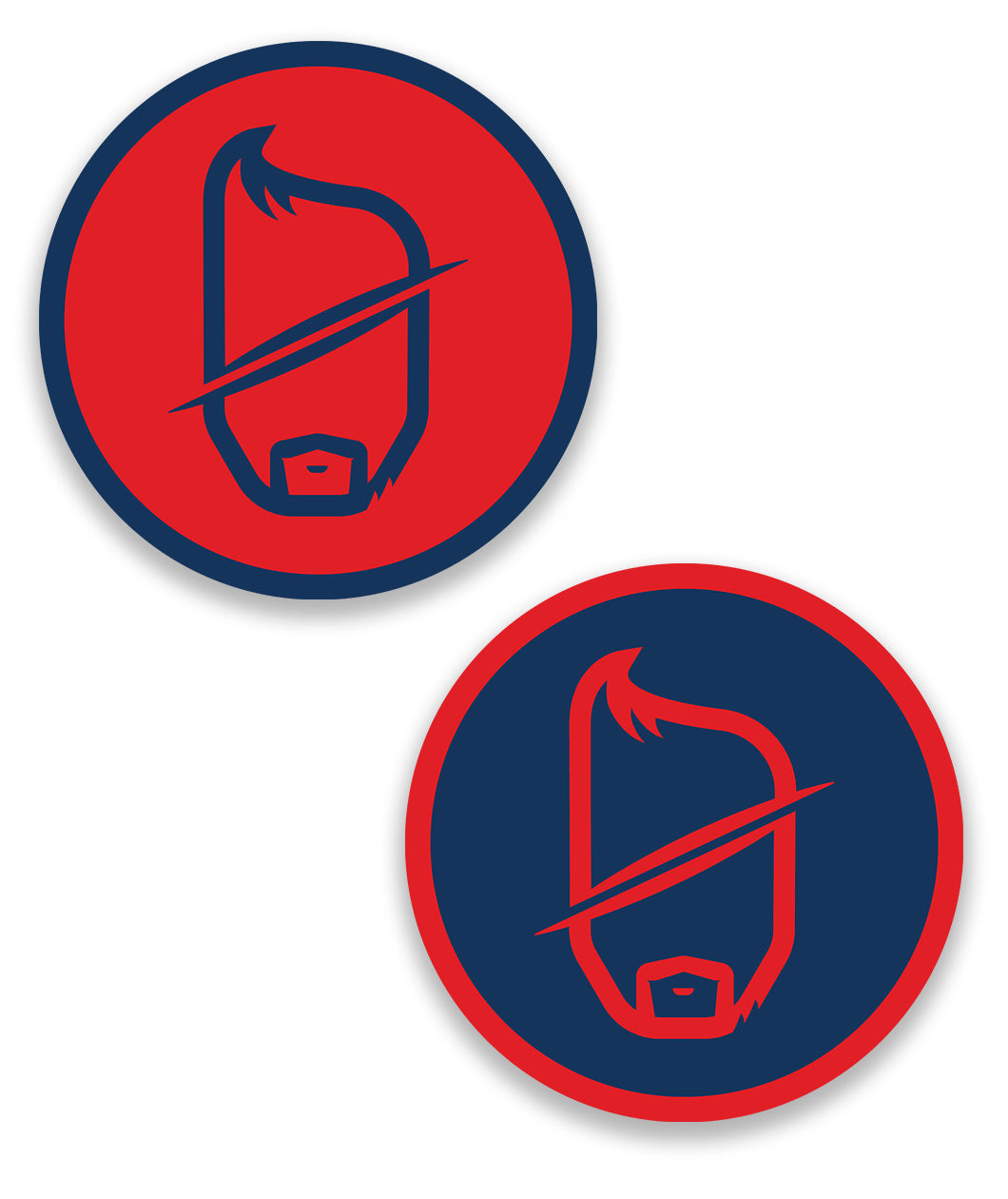 Pair of circle 2 inch stickers with a featureless male face with a goatee and a slash through the middle, surrounded by a circle. Red logo on navy sticker and navy logo on red sticker.