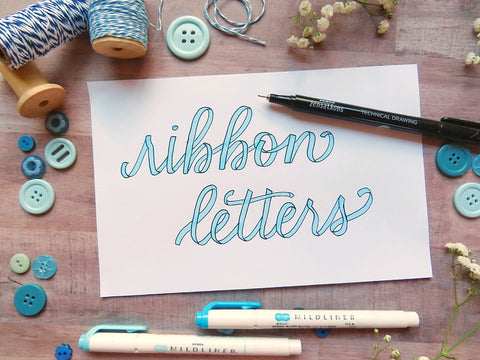 Ribbon lettering with outlined up and downstrokes