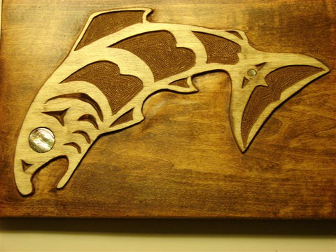 Pacific Northwest Native American salmon art style wood carving project, salmon relief carving in wood with abalone shell for eye.