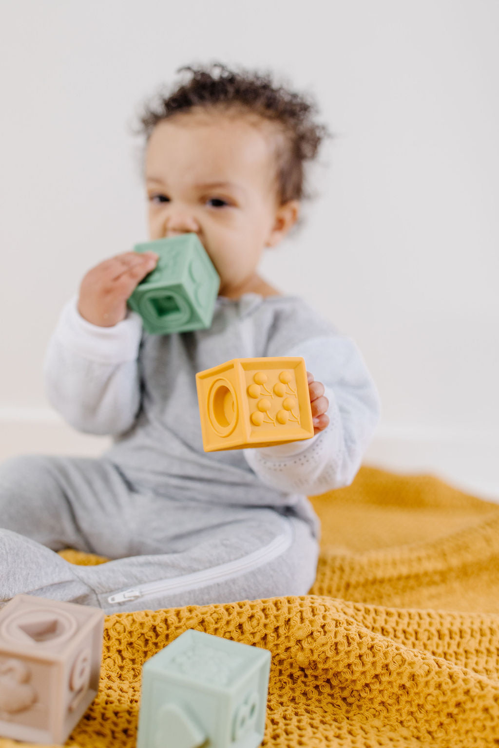 baby playing with toy