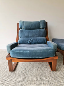 teal armchair with footstool