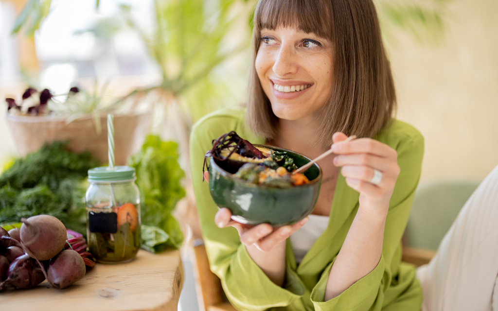 Woman eating thermogenic foods