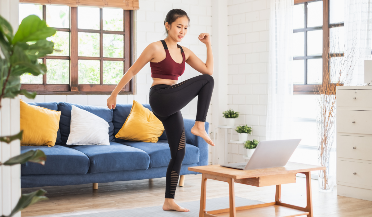 woman exercising at home