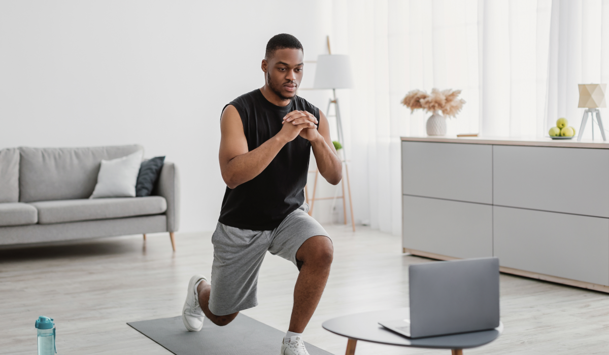 man doing quick exercise at home