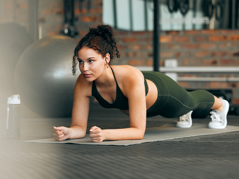 Woman exercising doing a plank