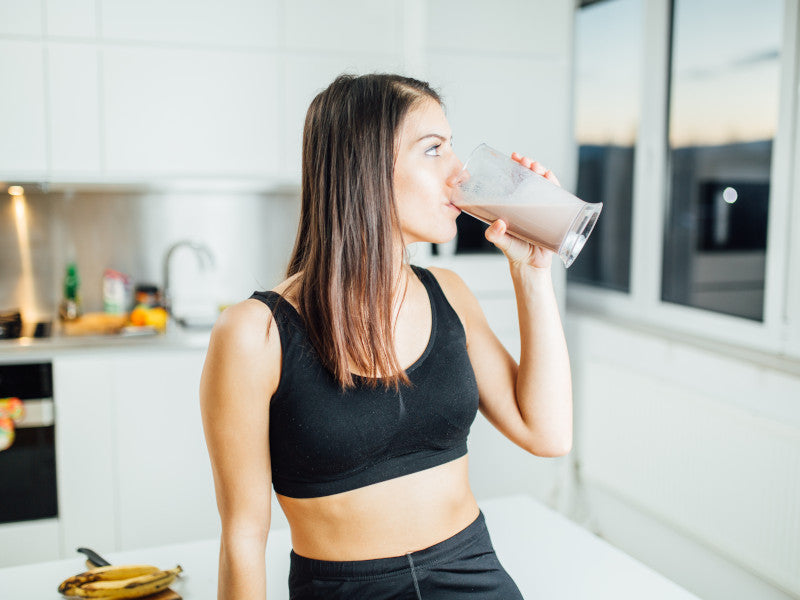 Woman drinking protein shake