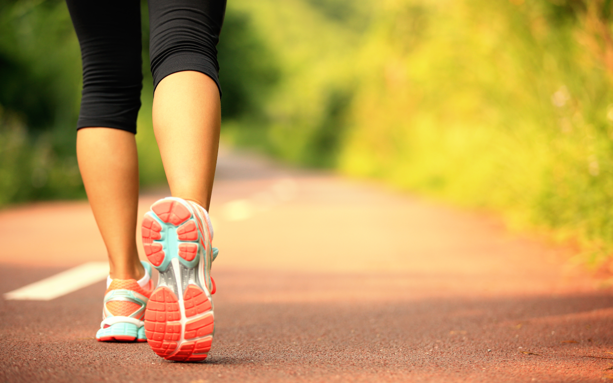 Woman walking on road