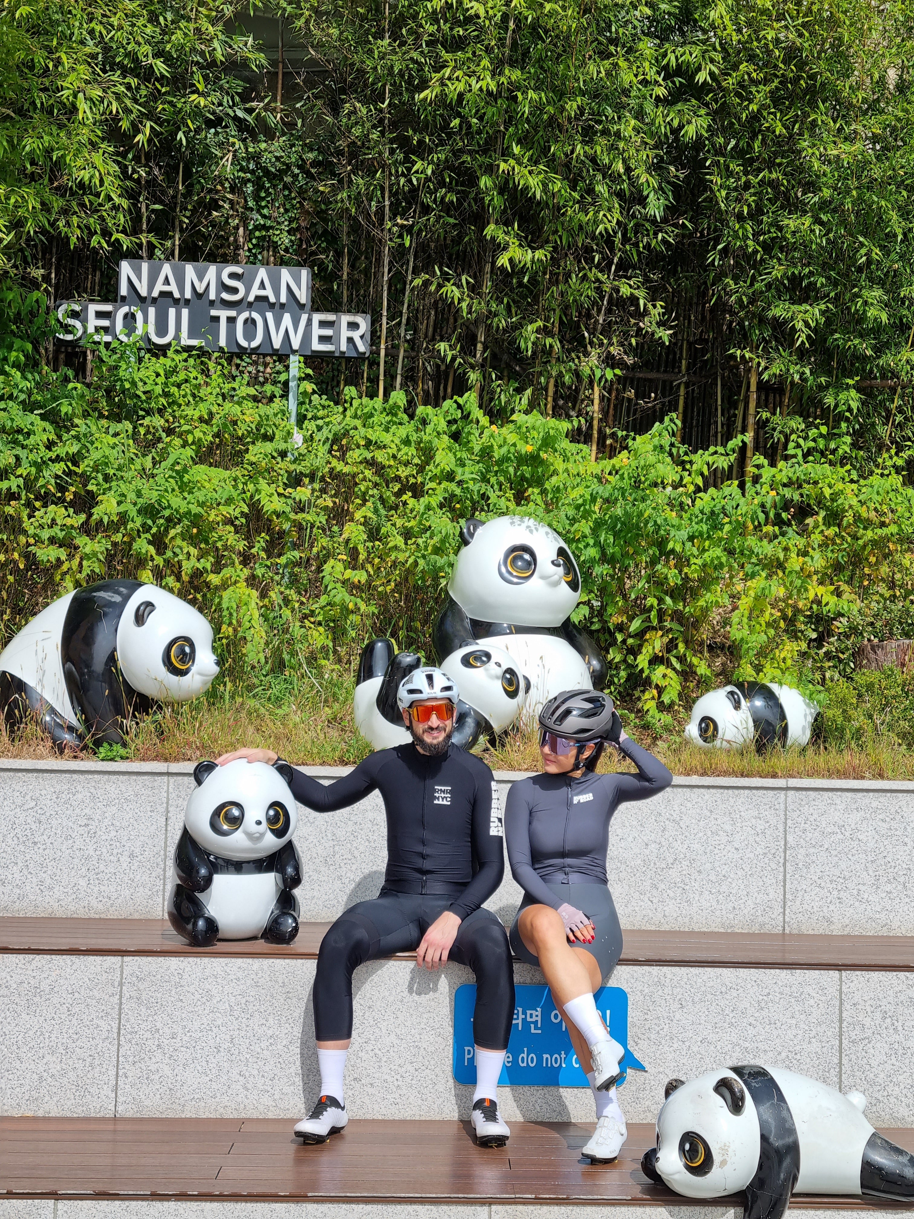 Posing with the pandas at the summit of Seoul's N Tower.