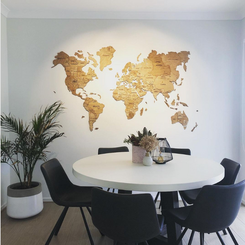 3D Wooden World Map in Terra Color in a Dining Room with Round Table