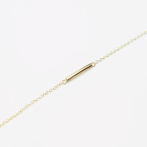 Example of trace chain - barre necklace in 9kt gold by Skomer Studio - chain guide