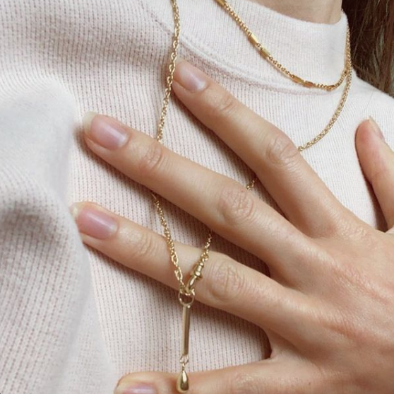 Magda wearing Skomer Studio jewellery - Drop Pendant Necklace in 9kt gold