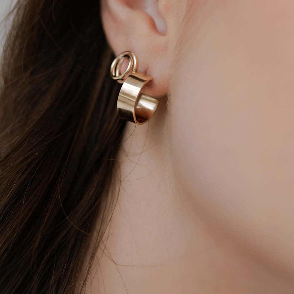 The Mini Everlasting stud Earrings in 9kt gold and the Cuff Hoop Earrings in 9kt gold - hoop layering jewellery trend