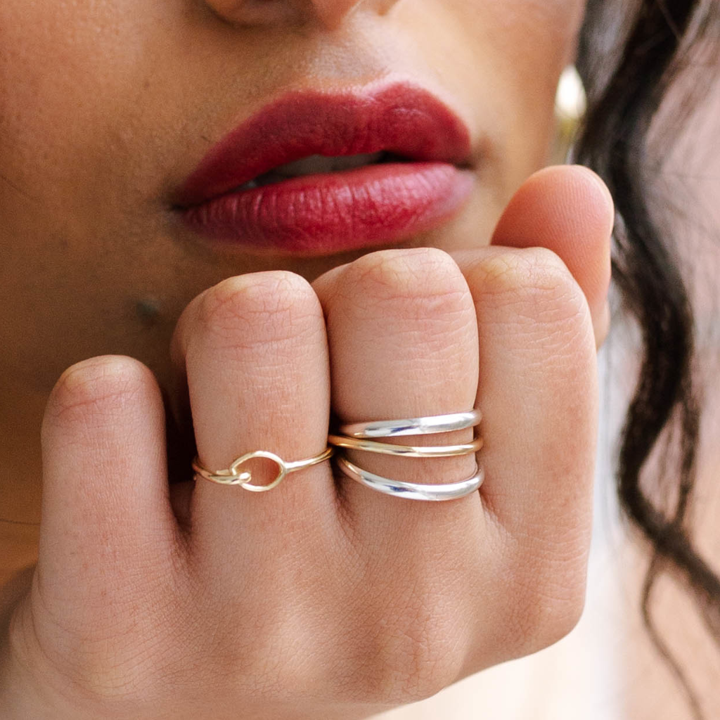 Swivel Ring worn with the Loop Ring - mixing precious metals jewellery trend - sterling silver and 9kt gold