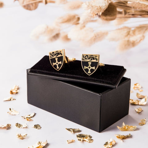 Gold plated cuff links with Newcastle University logo on