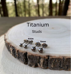5mm titanium ball studs on a slab of wood