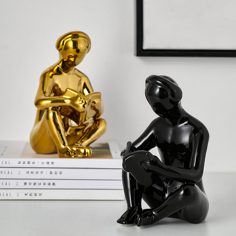 Reading With Headphone Statue